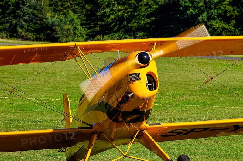A biplane Bücker Bü 131 Jungmann with registration SP-YPZ during a flight demonstration as part of an air show on Rossfeld in Metzingen-Glems, Baden-Württemberg, Germany, for editorial use only