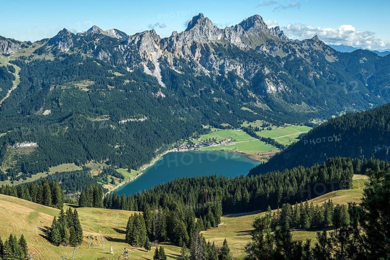 View from Neunerköpfle of Haldensee with Haller, Tannheimer Berge, Schartschrofen and Rote Flüh behind, Tannheimer Tal, Allgäu Alps, Tyrol, Austria