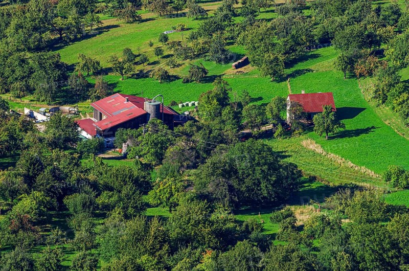 Picturesque rural area with farm at the foot of the Swabian Jura, Albtrauf auf dem Rossfeld in Metzingen-Glems, Baden-Württemberg, Germany