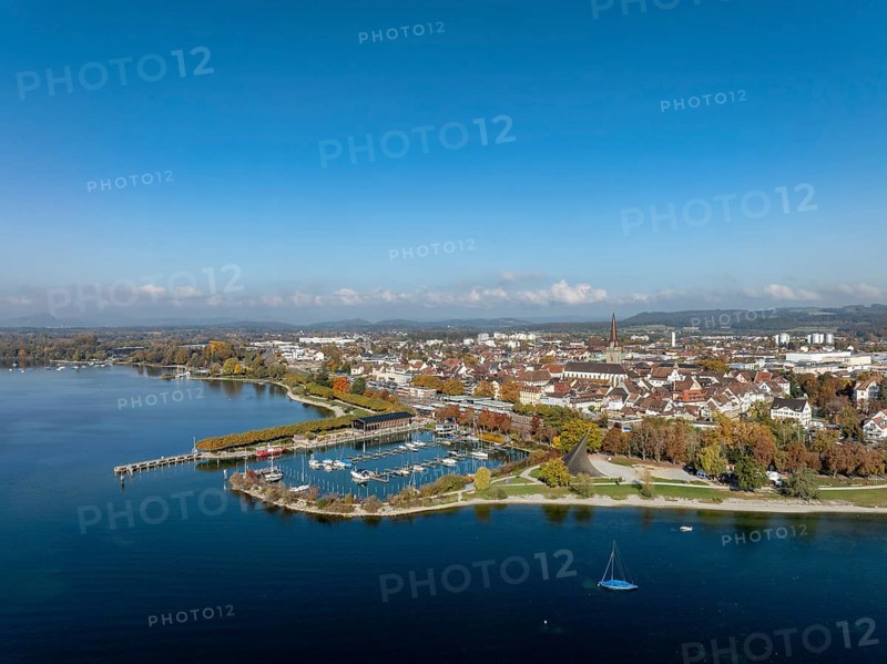 Aerial view of the town of Radolfzell on Lake Constance with the Wäschbruckhafen, harbour pier and concert sail, on the horizon the Hegauberge, district of Konstanz, Baden-Württemberg, Germany