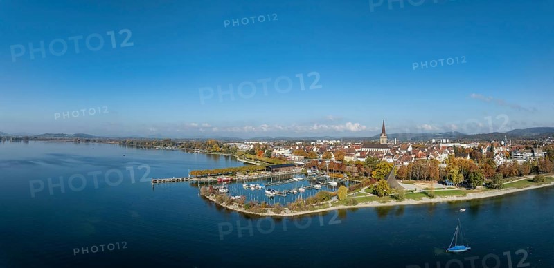 Aerial view, panorama of the town of Radolfzell on Lake Constance with the Wäschbruckhafen, harbour pier and concert sail, the Hegauberge Mountains on the horizon, Konstanz district, Baden-Württemberg, Germany