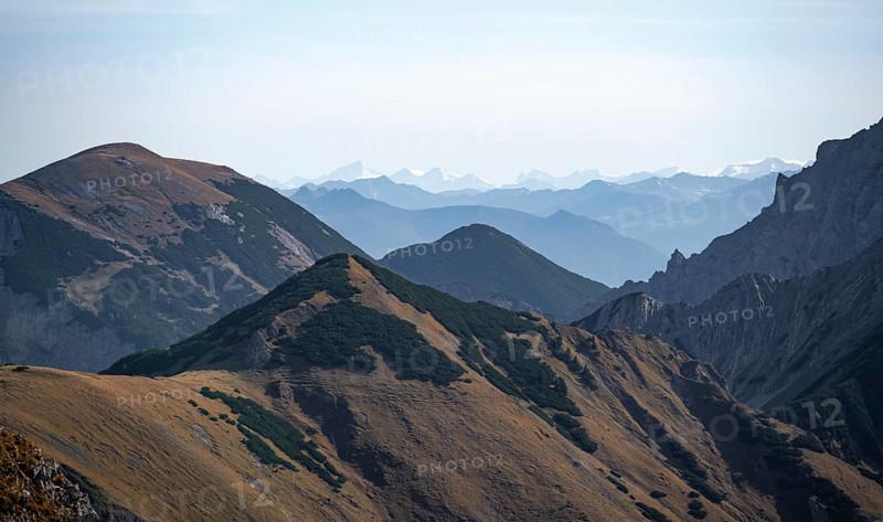Blurred mountainous landscape with rolling hills, eastern Karwendel, Tyrol, Austria
