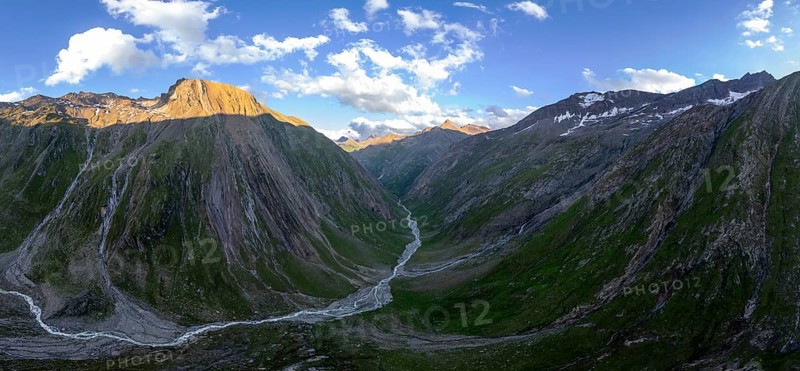 Steep Umbal Valley in the middle of the Austrian National Park Hohe Tauern, Steingrubenkopf and Bergtal at sunset, Alpine panorama, Hohe Tauern, East Tyrol, Austria