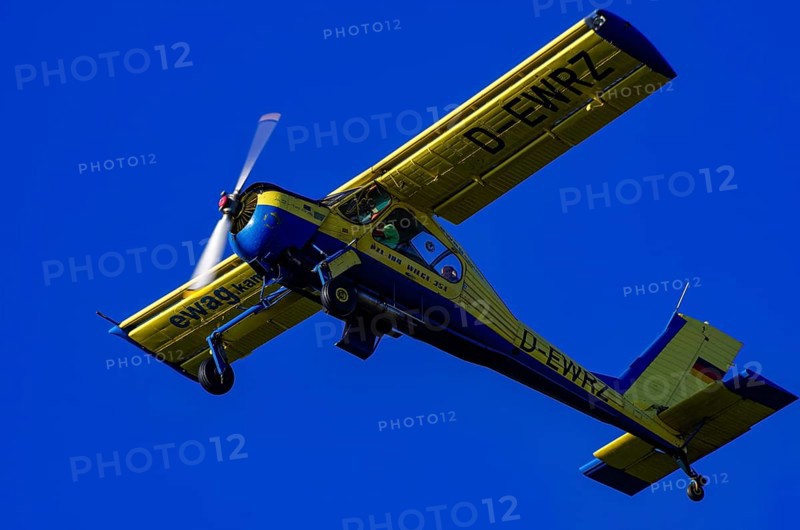 A PZL-104 Wilga-35A sport aircraft from Fliegerklub Kamenz with registration D-EWRZ during a flight demonstration as part of an air show on Rossfeld in Metzingen-Glems, Baden-Württemberg, Germany, for editorial use only