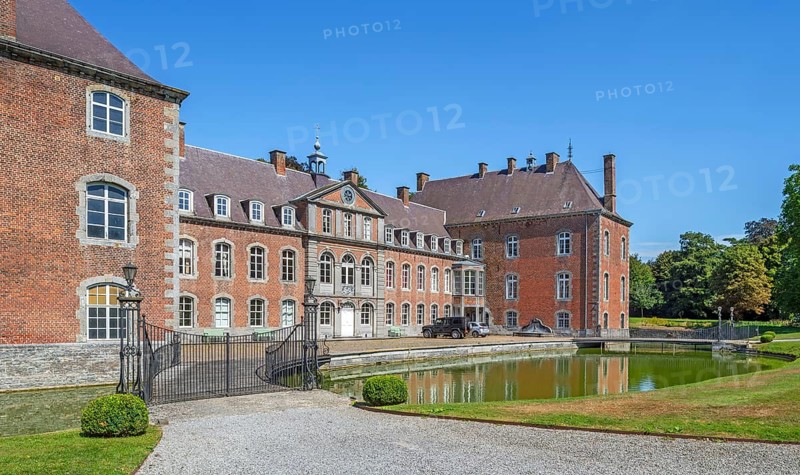 16th century Classicist Château de Franc-Waret in Louis XV style, moated castle in the village Fernelmont, province of Namur, Wallonia, Belgium