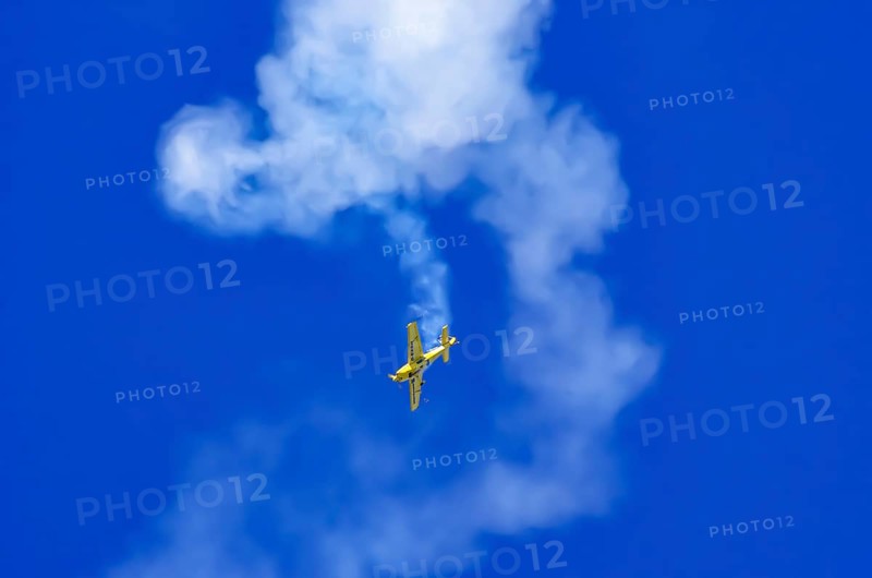 An Extra EA-300 from Extra Flugzeugproduktions- und Vertriebs GmbH with registration D-EXBH during a flight demonstration as part of an air show on Rossfeld in Metzingen-Glems, Baden-Württemberg, Germany, for editorial use only