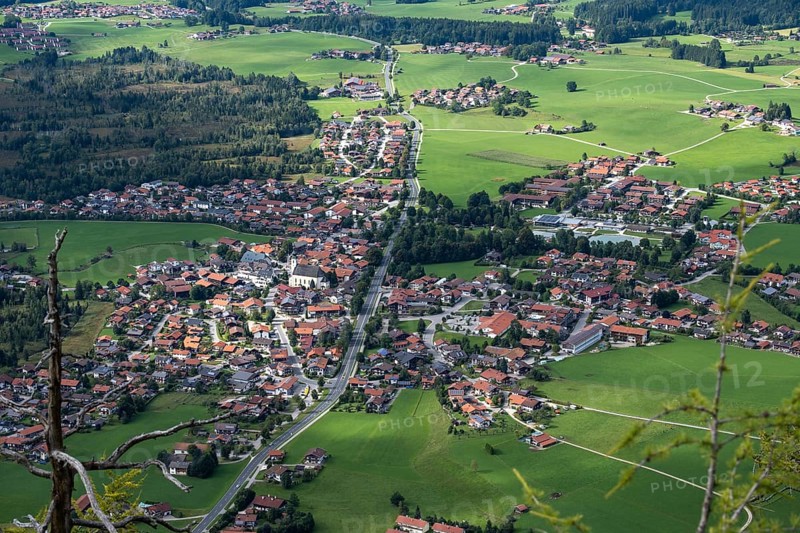 Deep view from Falkenstein of the alpine village of Inzell and the Inzeller moss, Bavaria, Germany