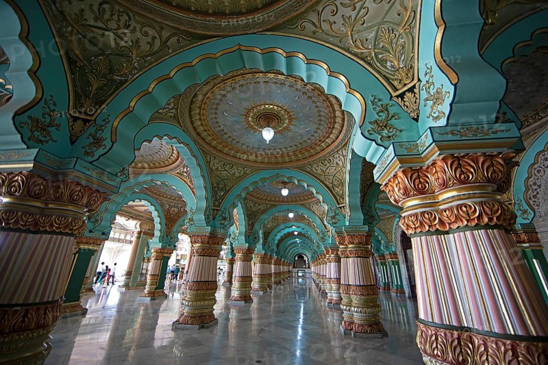 Granite columns with ornate arches and stucco ceilings, Durbar Hall in Mysuru Palace or Amba Vilas Palace, interior view, Mysore or Mysore, Karnataka, India