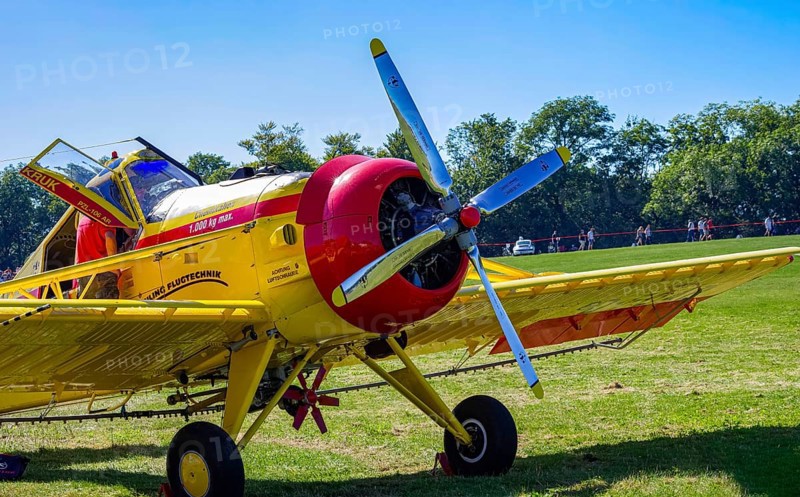 A PZL-106 AR Kruk agricultural aircraft with the registration D-FOAB and the original registration DDR-TAB as well as in the original colors of the company Agrarflug of Interflug as part of an air show on Rossfeld in Metzingen-Glems, Baden-Württemberg, Germany, for editorial use only