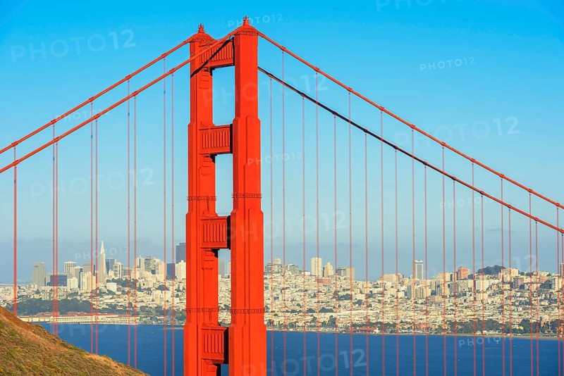 View of Golden Gate Bridge and financial district in the distance, San Francisco, California, USA