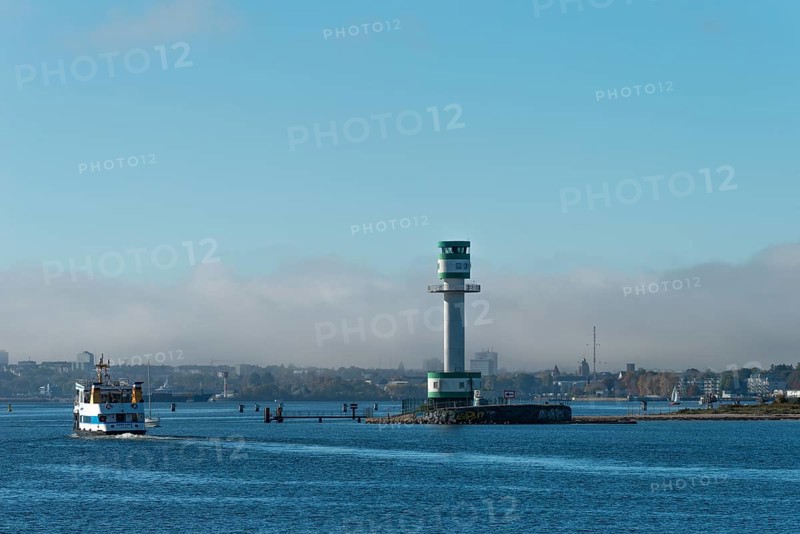 Green-white lighthouse Friedrichsort with city panorama of the state capital, Kiel Fjord, Kiel, haze bell, shipping, tower, architecture, landmark, orientation, navigation, shipping, blue sky, Schleswig-Holstein, Germany
