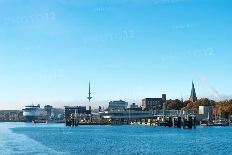 Kiel port, Kiel-Oslo ferry line, Color Line ferry and crusader, terminal at Sweden Quay, radio tower of St. Nikolai Church, Kiel Fjord, haze bell, blue sky, Baltic Sea, Schleswig-Holstein, Germany