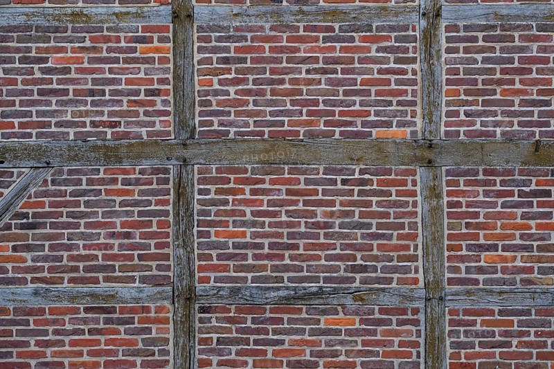 Brick wall and wooden beams on a half-timbered house, Legden, Münsterland, North Rhine-Westphalia, Germany