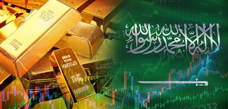 Gold bars stacked on Saudi Arabian flag. Saudi Arabia gold reserves, Concept