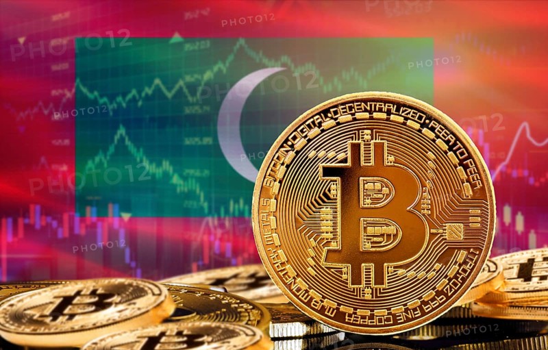 Investors in cryptocurrency and Blockchain Technology in Maldives, Concept. Bitcoin with Maldives flag in the background