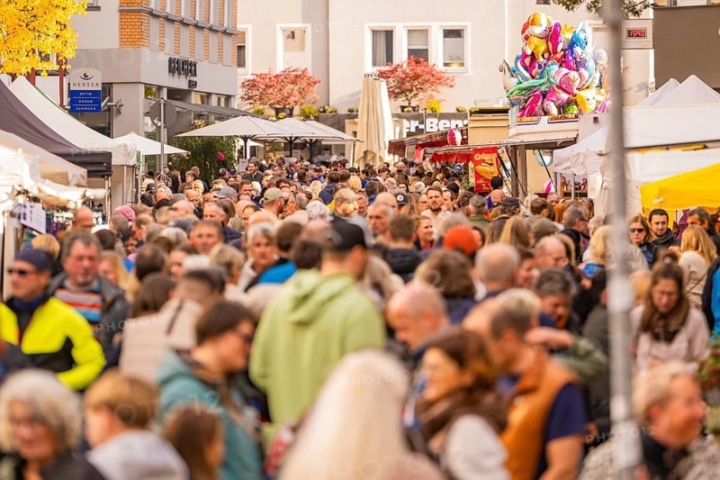 A lively market with numerous visitors and colorful stands, Urschelherbst street festival, Nagold, Germany
