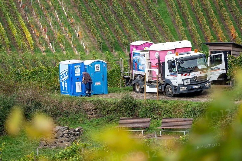 Emptying and cleaning mobile toilets Dixi toilets, Toi-Toi toilets in the vineyard in the Ahr Valley, next to a break area, near Mayschoß, Rhineland-Palatinate