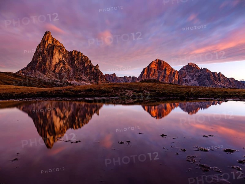 Alpine glow, reflection of the Ra Gusela and Tofane mountains at dawn, Passo di Giau, Giau Pass, Dolomites, Alps, Belluno province, Veneto region, Italy