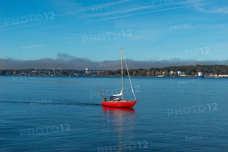 Kiel Fjord, Holtenau district, Kiel, Baltic Sea, high bridge over Kiel Canal, NOK, waterway, motoring sailor, SKN silo in the North Harbour, wooded slope, building, quiet sea, Schleswig-Holstein, Germany