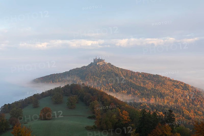 Hohenzollern Castle in a sea of fog at sunrise, autumn in the Swabian Jura