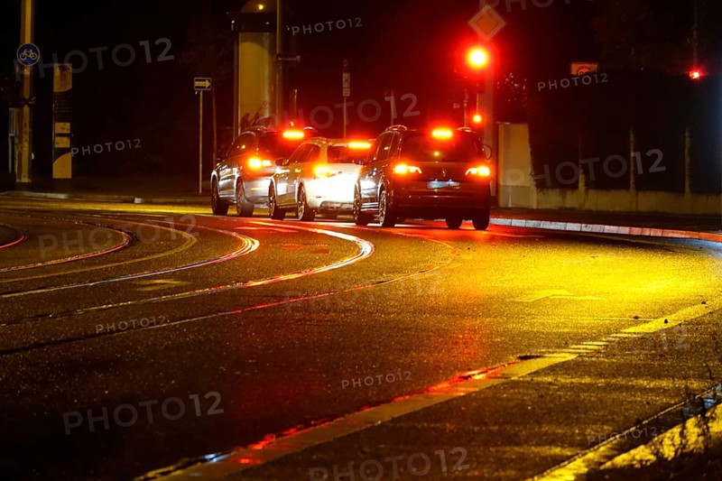 Road traffic at night and poor visibility in a city, autumn, Germany