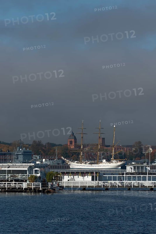 Kiel naval port, district of Wik, sailing school ship Gorch Fock in their home port, tower of the Petrus Church garrison church, Seebar Düsternbrook, Schleswig-Holstein, Germany