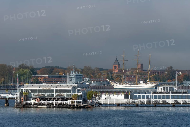 Kiel naval port, district of Wik, sailing school ship Gorch Fock in their home port, supply ship A512 of the German Navy, tower of the garrison church Petrus-Kirche, Seebar Düsternbrook, Schleswig-Holstein, Germany