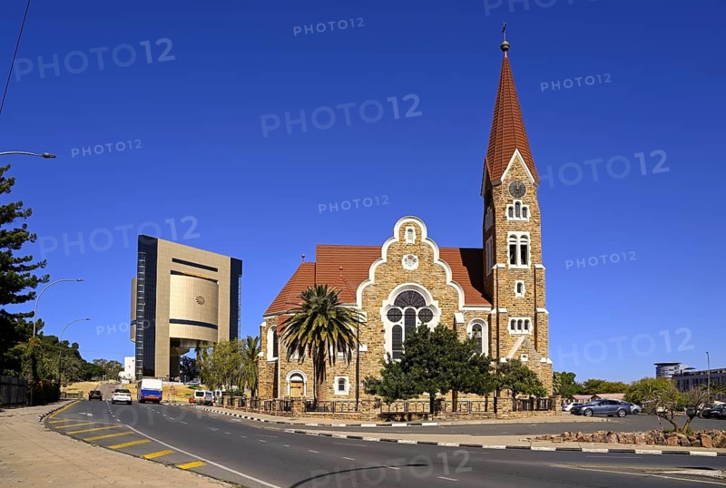 Evangelical Lutheran Christ Church from 1910, in the background the Independence Museum, Windhoek, Khomas region, Namibia