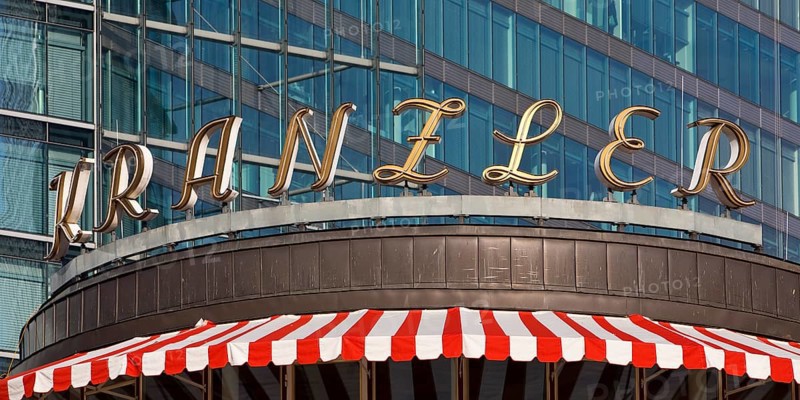 Historic logo of Café Kranzler with modern office building on Kurfürstendamm, Charlottenburg, Berlin, Germany