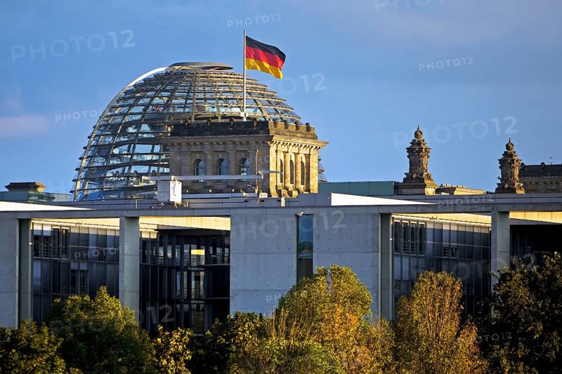 Reichstag dome with German flag, German Bundestag, government district, Berlin, Germany