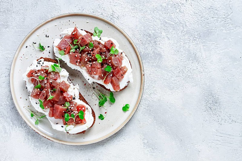 Sandwiches, rye bread with cream cheese, sliced tuna fillet with herbs, breakfast, homemade