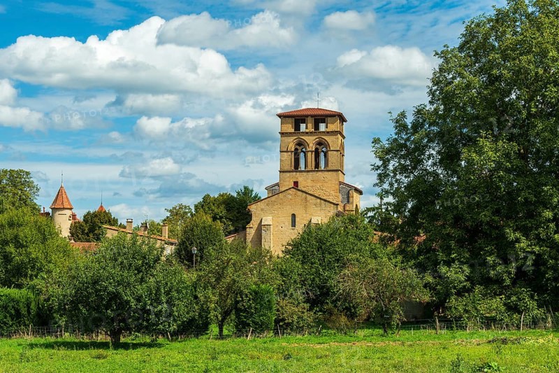 Mailhat village. Romanesque church with its square bell tower, Puy de Dome department, Auvergne-Rhone-Alpes, France