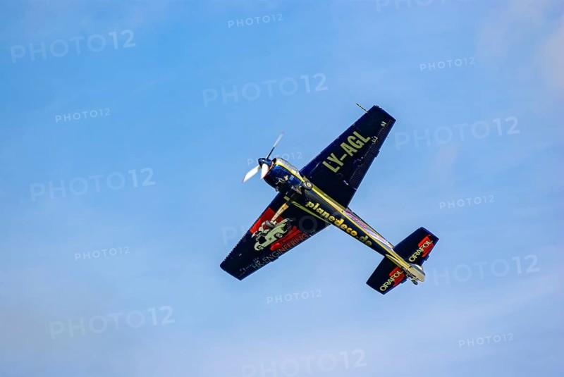 A Jakovlev Jak-55 with the registration LY-AGL during a flight demonstration as part of an air show at the Rossfeld in Metzingen-Glems, Baden-Württemberg, Germany, for editorial use only