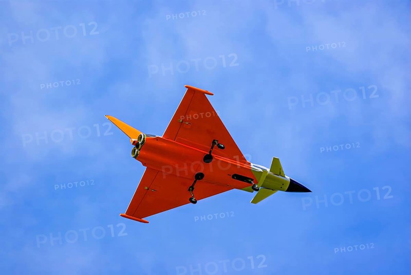 An RC model of a Eurofighter Typhoon during a flight demonstration as part of an air show at the Rossfeld in Metzingen-Glems, Baden-Württemberg, Germany, for editorial use only
