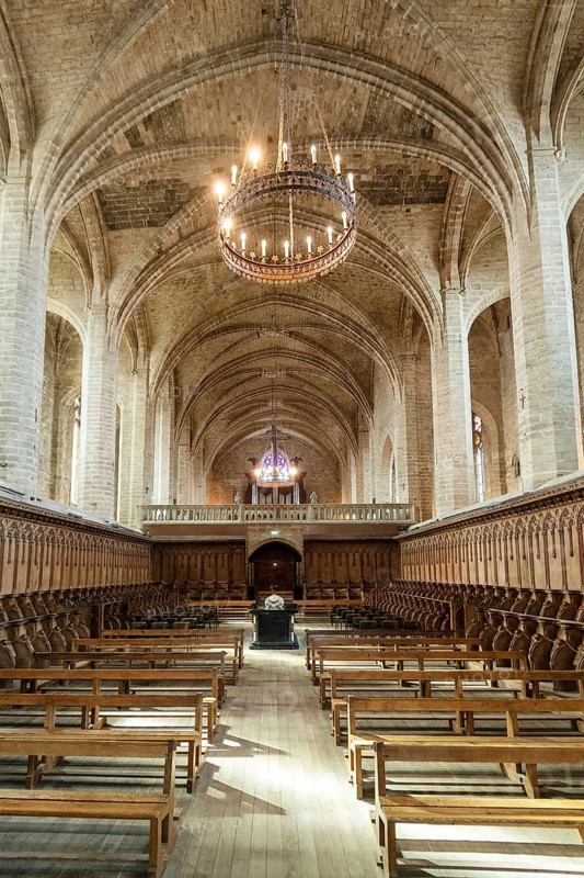 Choir stalls and Pope Clement VI tomb Saint Robert Abbey, La Chaise Dieu, Haute Loire, Auvergne Rhone Alpes, France