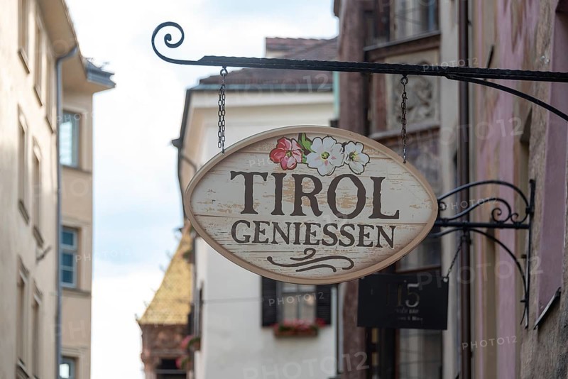 Nostalgic inn sign with the inscription Tyrol genießen, Innsbruck, Tyrol, Austria