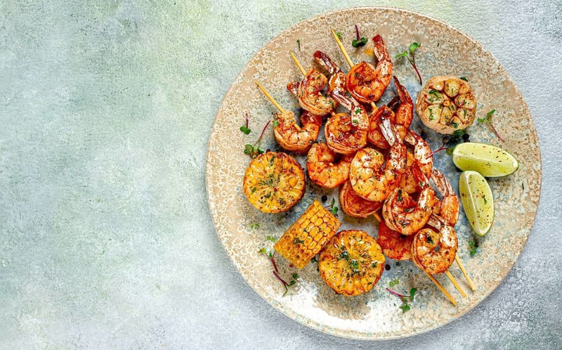 Tiger prawns on skewers, shrimp kebab, with corn, fried, homemade, no people