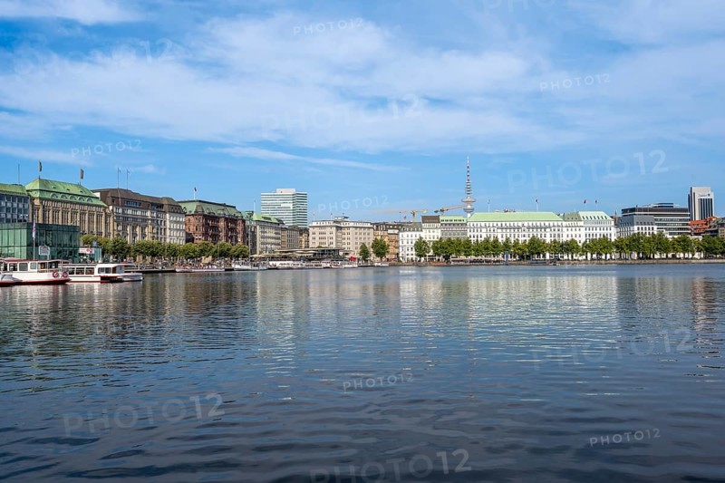 View over the Inner Alster to prestigious office blocks, hotels and commercial buildings and television tower, Hamburg, Germany