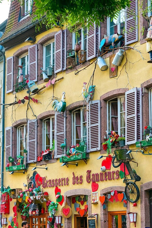 Decorated historic half-timbered house in the old town centre of Colmar, France