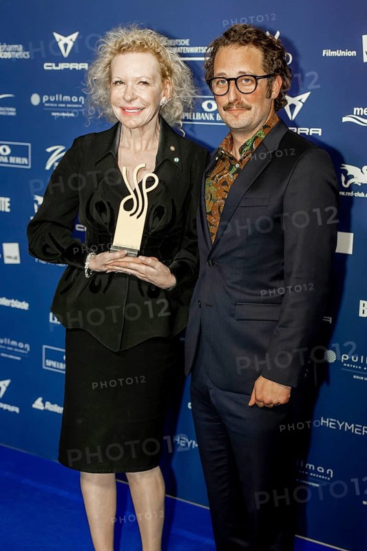Sunnyi Melles (here next to Bastian Reiber) receives the German Acting Award 2025 for the category Comedic Role in Die Zweiflers at the German Acting Award Ceremony at Pullmann Berlin Schweizerhof, Berlin, 09.10.2025