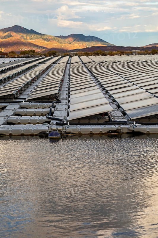 Park City, Utah - Floating solar panels provide power for Mountain Regional Water. The solar array is on the raw water storage pond at the water utility's Signal Hill Treatment Plant