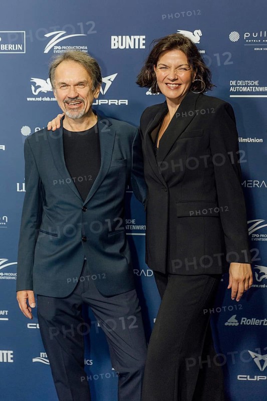 Martin May and Stephanie Damare on the red carpet in front of the award ceremony at Pullmann Berlin Schweizerhof, Berlin, 09.10.2025