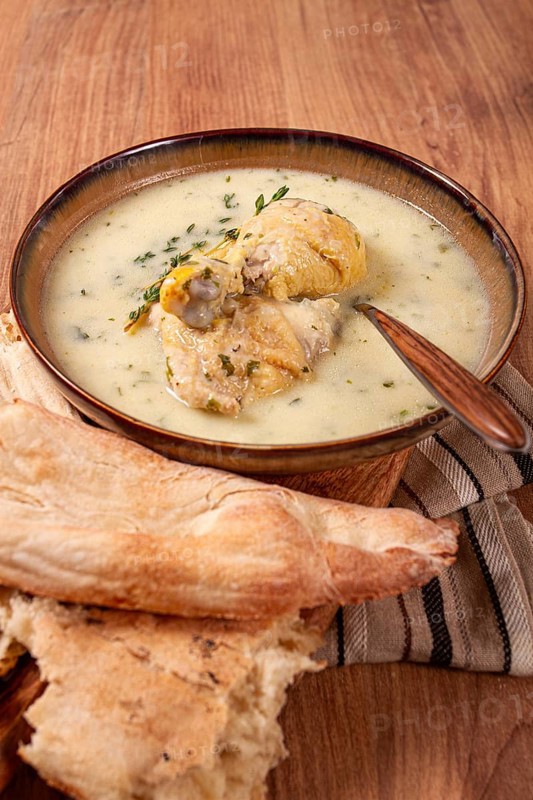 Chikhirtma chicken soup, Georgian dish, with lavash, top view, no people