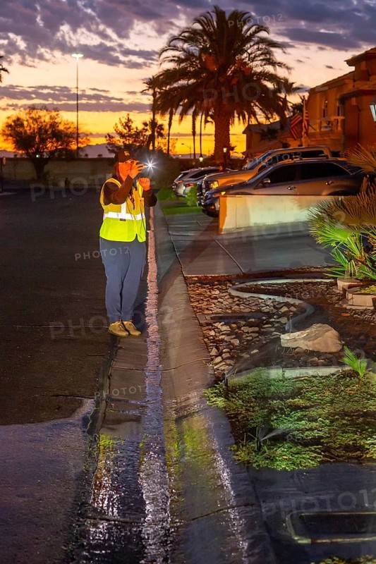 Las Vegas, Nevada - Devyn Choltko, a water waste investigator, patrols a residential neighborhood, recording and issuing tickets for illegal water use. The Las Vegas Valley Water District has cut usage of scarce Colorado River water by more than 30% over the last 20 years despite a growing population