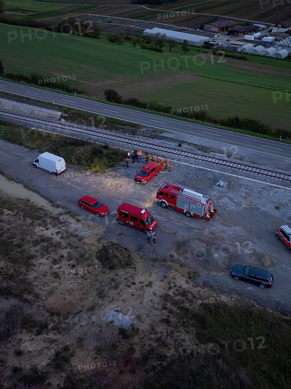 Aerial view of an operation site on railway tracks, several fire engines can be seen, fire drill in the new construction tunnel of the Hermann Hessebahn, Ostelsheim, district of Calw, Germany