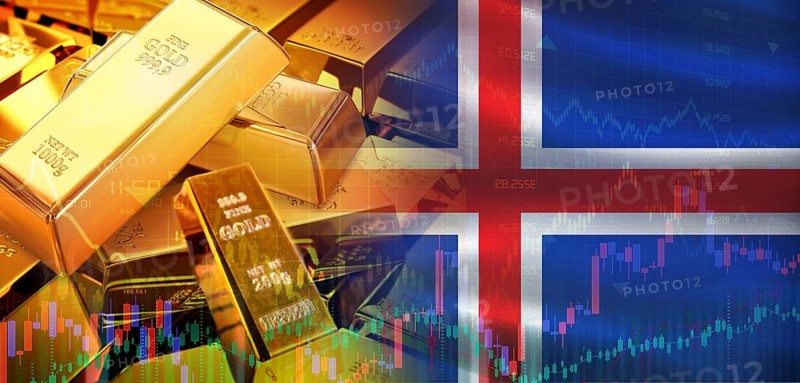 Gold bars stacked on Icelandic flag. Iceland gold reserves, Concept