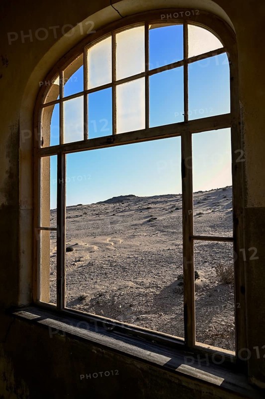 View from a former dwelling house into the desert, Kolmanskop, restricted diamond area, Karas region, Namibia