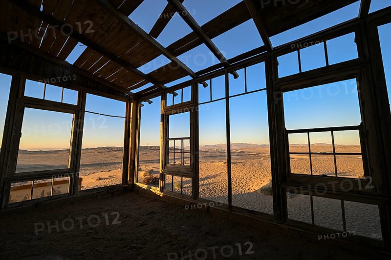 View from a former dwelling house into the desert, Kolmanskop, restricted diamond area, Karas region, Namibia