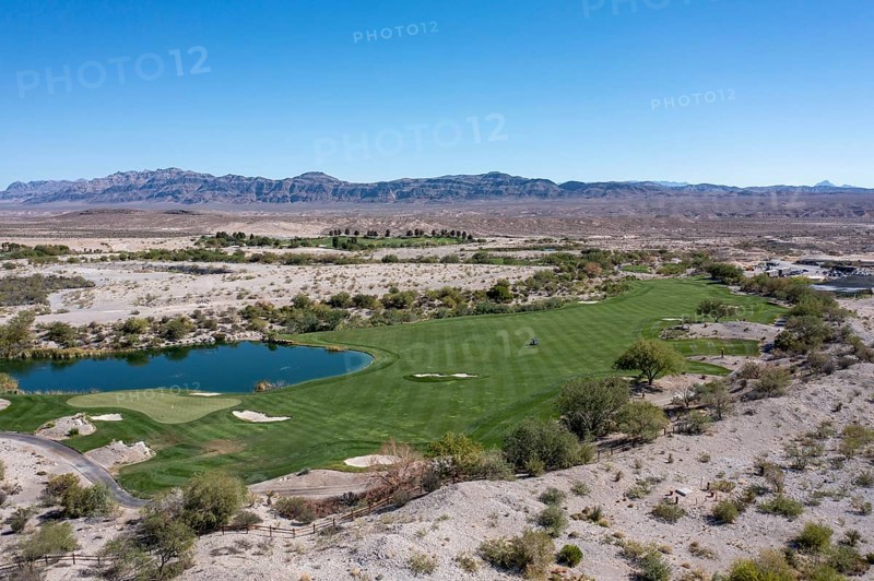Coyote Ssprings - The Coyote Springs golf course in the Nevada desert. The Jack Nicklaus-designed course was originally to be surrounded by a planned community of 160, 000 homes. The golf course opened in 2006 but the homes were never built