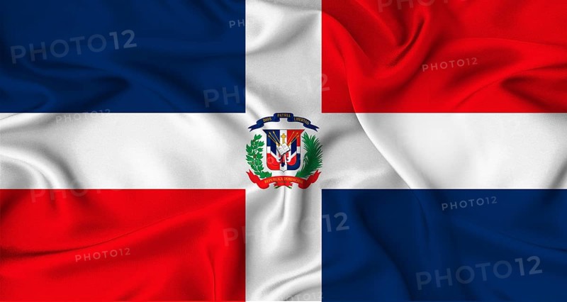 Realistic Dominican Republic flag waving. Close up of flag of Dominican Republic with cloth texture